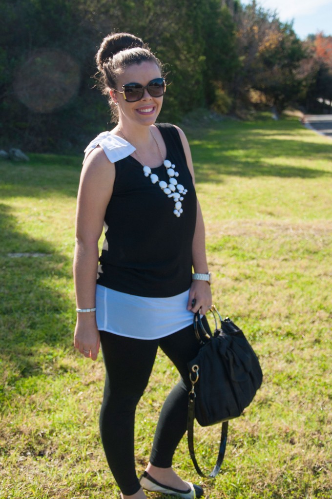 All That Glitters: Black leggings with a black and white bow top