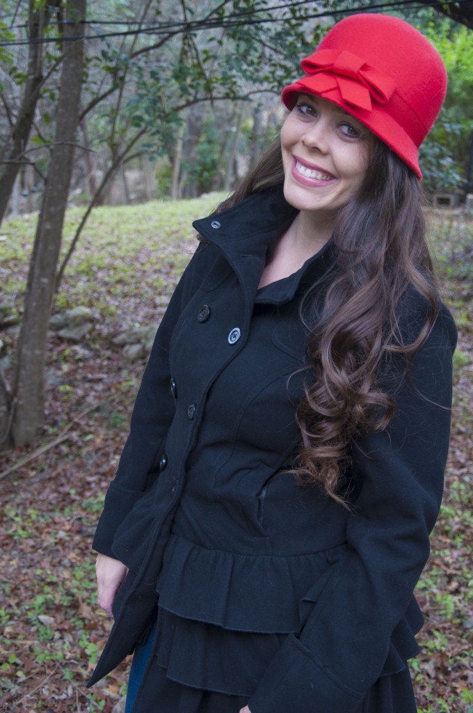 Black ruffle jacket with red bow hat