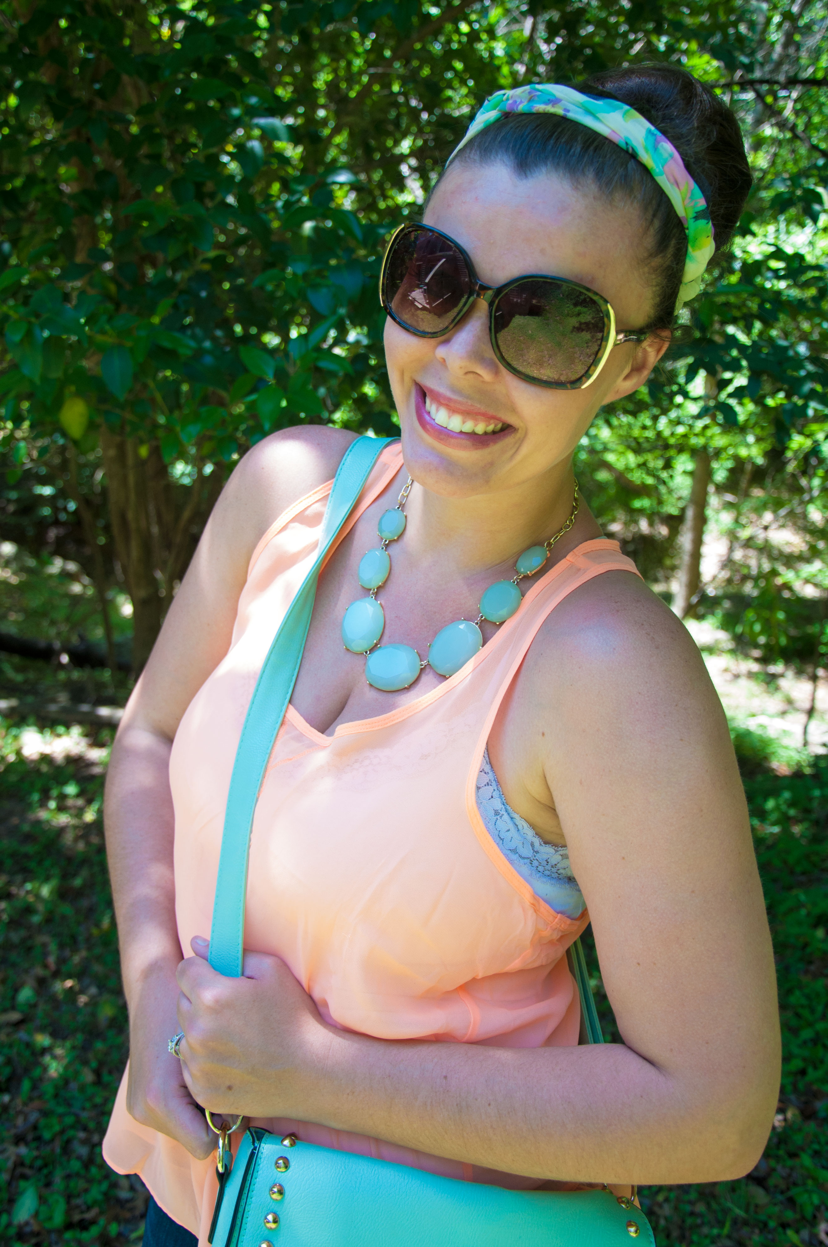 Peach ruffle top with mint accessories