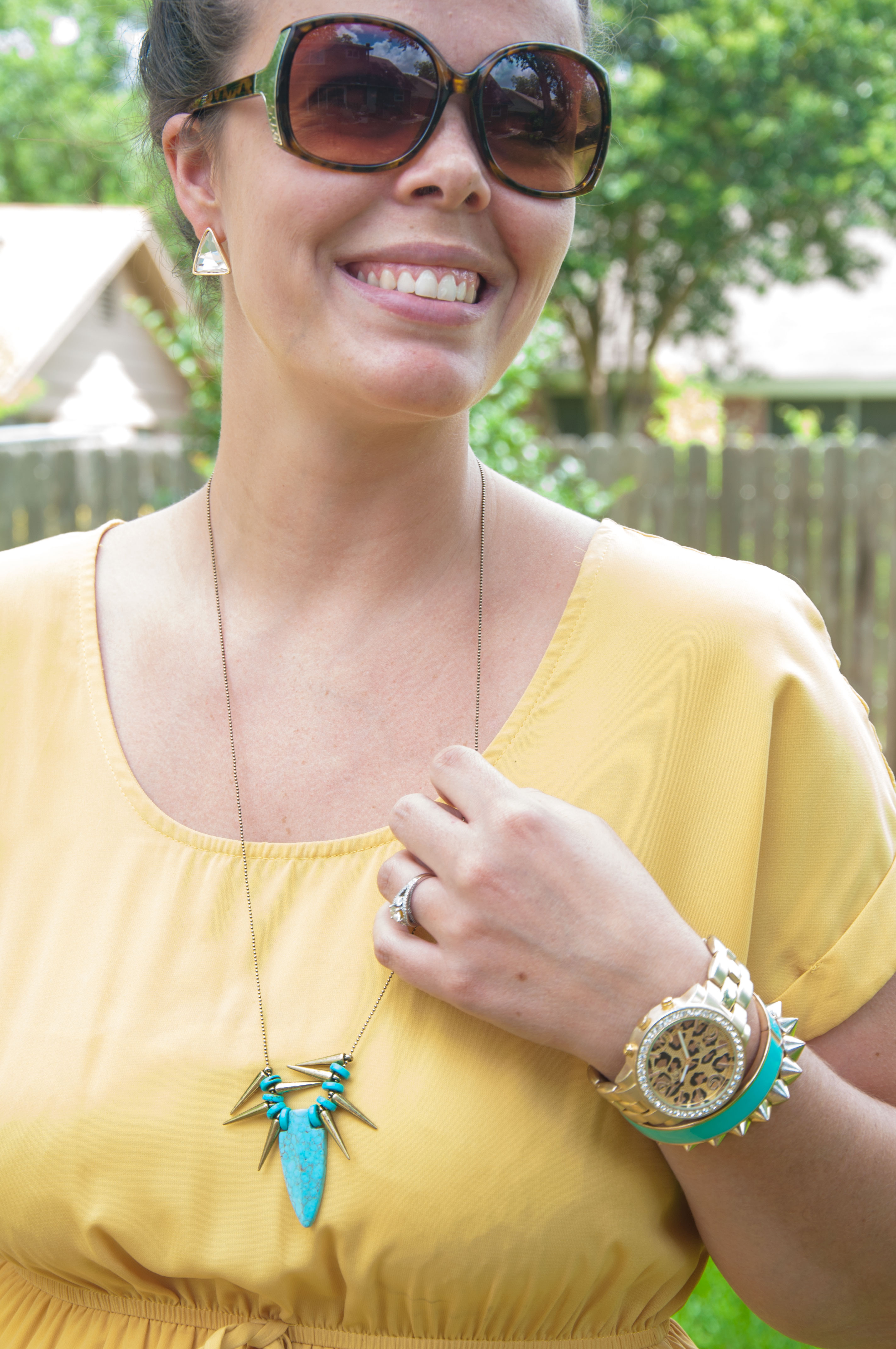 Yellow dress with turquoise spike necklace